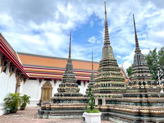 Fototapeta premium Wat Pho or Pho temple, an ancient temple, Buddha, Wat Phra Chetuphon Wimon Mangkhalaram, Buddhism, religion, architecture, exterior, Bangkok, Thailand, Thailand Destination