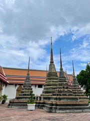 Fototapeta premium Wat Pho or Pho temple, an ancient temple, Buddha, Wat Phra Chetuphon Wimon Mangkhalaram, Buddhism, religion, architecture, exterior, Bangkok, Thailand, Thailand Destination