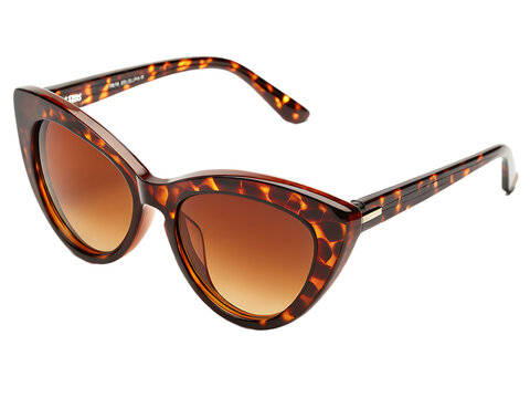 Close up of brown tortoise shell sunglasses with gradient lenses on a black background studio shot