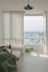 Fototapeta premium Woman taking a nap using phone in her apartment on weekends.