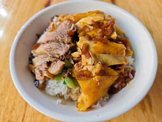 fresh chicken with pork meat on the rice for eating
