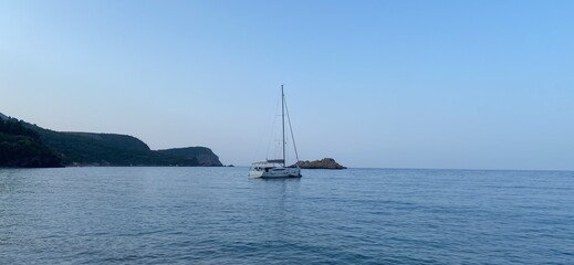 Montenegro Adriatic Sea coast Sveti Stefan, sandy beach and next to luxury resort island, panorama
