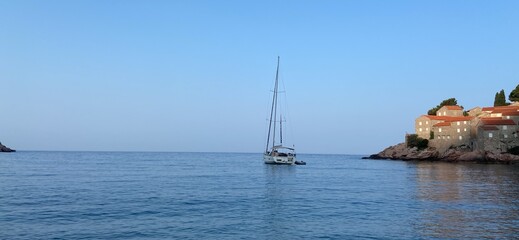 Montenegro Adriatic Sea coast Sveti Stefan, sandy beach and next to luxury resort island, panorama