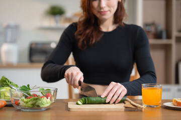 Fit woman enjoys healthy fruit breakfast after yoga training. fitness, nutrition, home lifestyle.