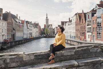 Fototapeta premium Girl possing in Bruges Belgium