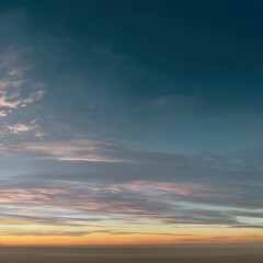 A beautiful blue sky with a few clouds