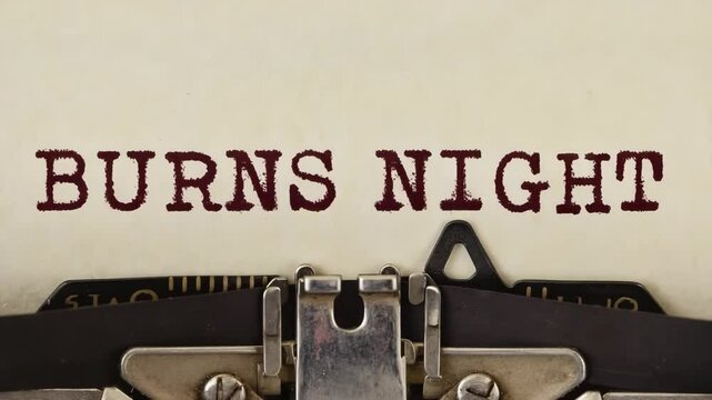 Text reading 'BURNS NIGHT' typed on vintage typewriter paper. The scene captures the essence of a traditional Scottish celebration.