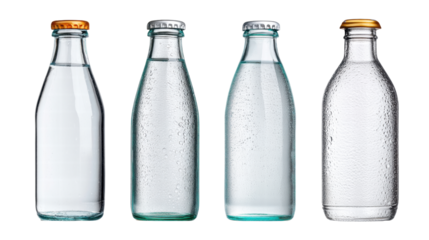 Set of four glass bottles with different caps, standing side by side transparent background