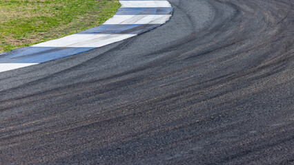 Car tire mark on race track, Abstract black car tire mark on race track, Abstract texture background car tire mark skid mark on asphalt circuit, Tire track on road race speed track circuit.