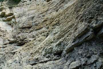 View of sedimentary rocks near a waterfall