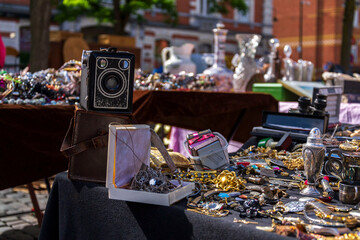 Old vintage things on the street flea market on Place du Jeu de Balle, Marolles district of Brussels, Belgium