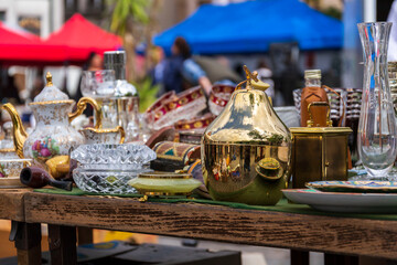 Old vintage things on the street flea market on Place du Jeu de Balle, Marolles district of Brussels, Belgium