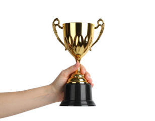 hand holding a golden trophy