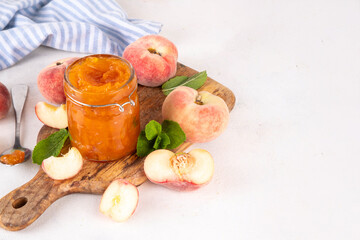Flat chinese donuts fig peach jam, homemade confiture preserves with fresh fresh fig peaches and mint in white background copy space