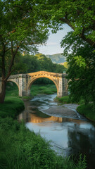 Sunlit historic stone bridge spans a tranquil river amid lush greenery.









