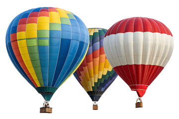 Fototapeta premium A view of three colorful hot air balloons floating against a dark background on a clear day outside