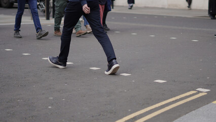 Crowd walking anonymously in an urban setting