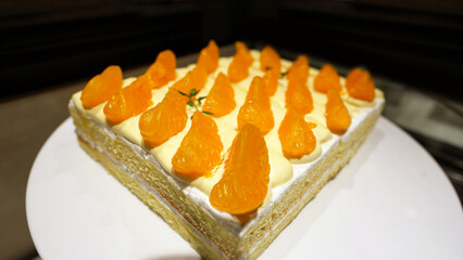 Orange Cream Cake Topped with Citrus Segments