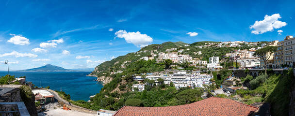 Panoramic view of the city of Vico Equense with Vesuvius and the blue waters of the Gulf of Naples. Italy