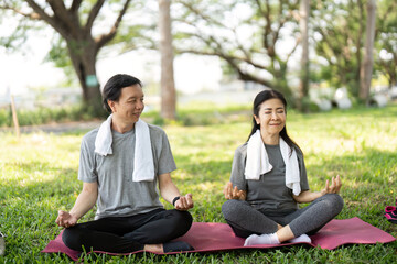 Couple Meditating Together in a Peaceful Outdoor Setting. Mindfulness Practice.
