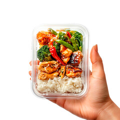 Takeout container with rice, chicken, broccoli and peppers held by a hand. The container is clear and rectangular with a fitted lid.