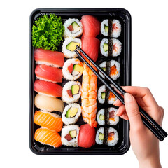 Assorted sushi platter featuring fresh tuna, salmon, shrimp, and California rolls, with chopsticks picking up a piece from the tray.