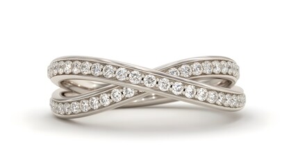 Close-up view of a luxurious silver ring adorned with numerous sparkling white diamonds arranged in an intertwining design. The ring rests against a clean white backdrop.
