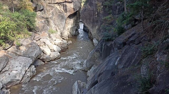 flowing water stream creek river rock stone. Tranquil summer nature view