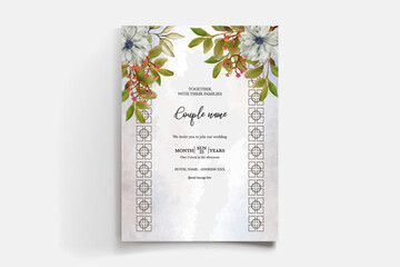 WEDDING INVITATION FRAME WITH FLOWER DECORATIONS AND FRESH LEAVES