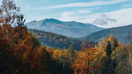 Obraz premium Autumn Mountain Distant View: Unveiling the Serene Tapestry of Seasonal Landscapes, Cultural Symbolism, and Natural Aesthetics in Scenic Overlooks and Panoramic Vistas