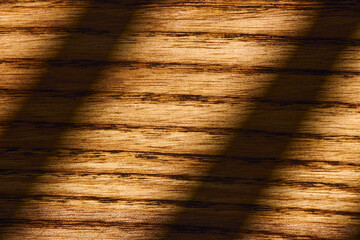 A close-up view of beautifully grained wood reveals rich, warm tones and smooth textures.