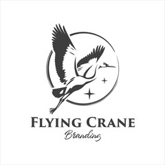 Crane Stork Flies Flapping Its Wings Logo Design