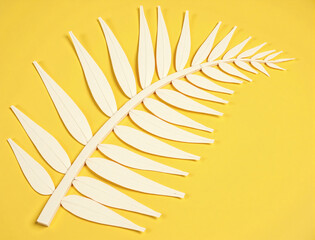 Minimal Paper Palm Leaf on Yellow Background