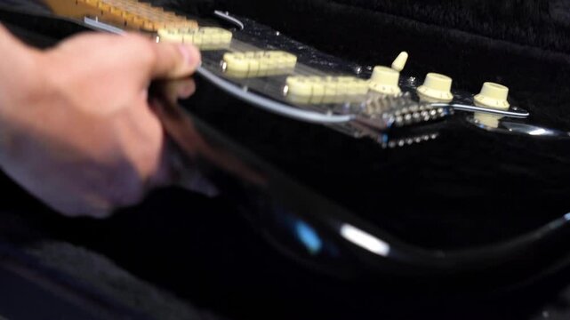 Master guitar techniques: sound adjustments and strumming patterns