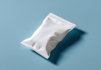 Minimalist mockup featuring a blank white snack package laying on a colored background.