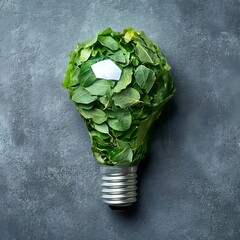 Eco friendly light bulb from fresh leaves top view concept