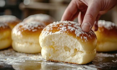Freshly baked buns with powdered sugar