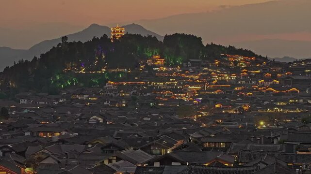 Aerial view of the Old Town with jade dragon mountain of Lijiang in Yunnan, China