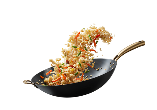 Vegetable fried rice in wok pan isolated on transparent background