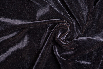 Black velvet fabric with spiral folds