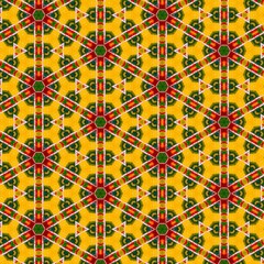 Seamless kaleidoscope floral pattern vivid geometric shapes in red, green, and yellow design for fabric, wallpaper, and backgrounds