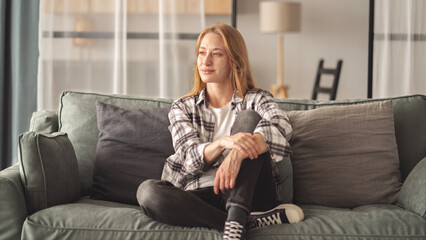 Young woman feels peaceful at home