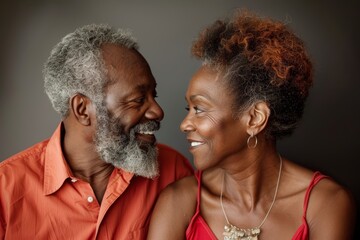 Portrait of a blissful couple in their 40s exchanging glances