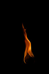 Captivating Flame Dancing in Darkness with Vibrant Orange Glow
