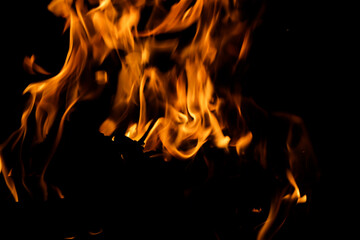 Bright Flames Dancing in the Darkness with Flickering Light Effect