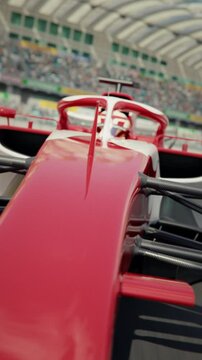 Close front view of a generic race car driving around a curve. Formula one racing.  Dynamic tracking shot. Multiple race cars. 3D animation rendering