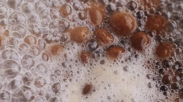 Organic tapioca pearls close-up in a bowl on a wooden table, asian dessert dish, chinese traditional drink, dry pearl.