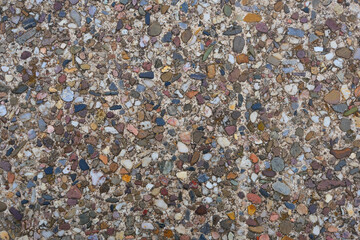 A close up of a rock covered in small rocks