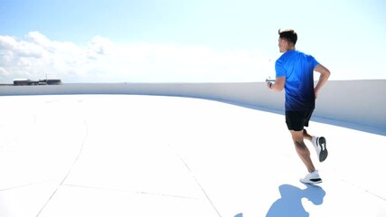 Runner Enjoys a Vibrant Morning Jog Along a Sunlit With Clear Blue Skies Above and a Sense of Freedom in the Air