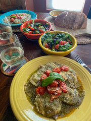 Colorful Italian Dinner with Ravioli and Fresh Salad
